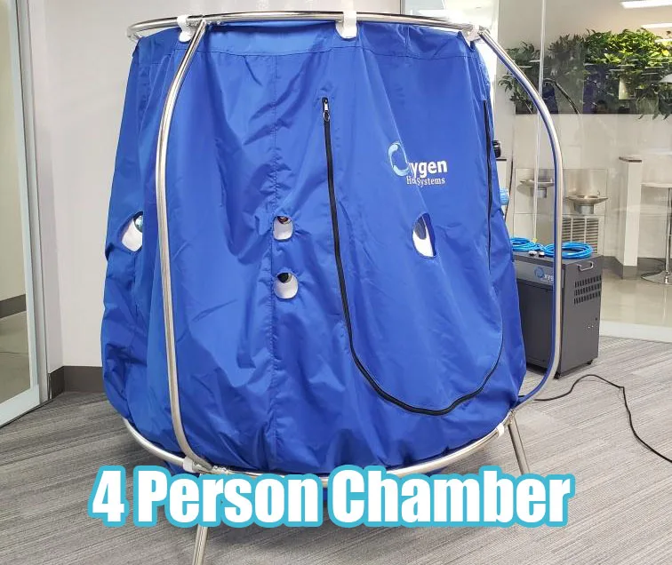 Four-person soft-shell hyperbaric chamber set up and pressurised in a client space.
