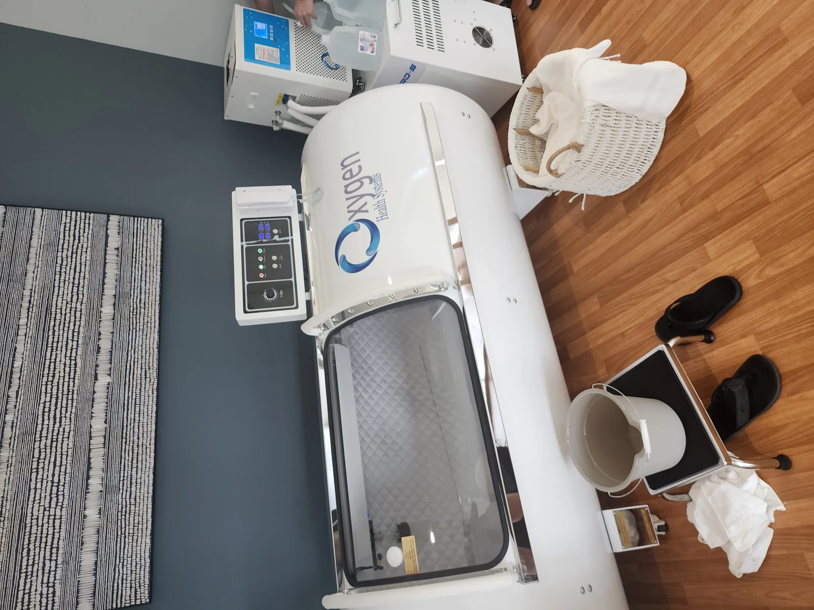 Hyperbaric Service Pros technicians assembling a hard-shell hyperbaric chamber on site.